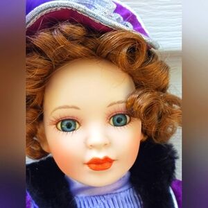 Porcelain Doll with Purple Outfit and Curly Hair. Collectlble Memories Lila